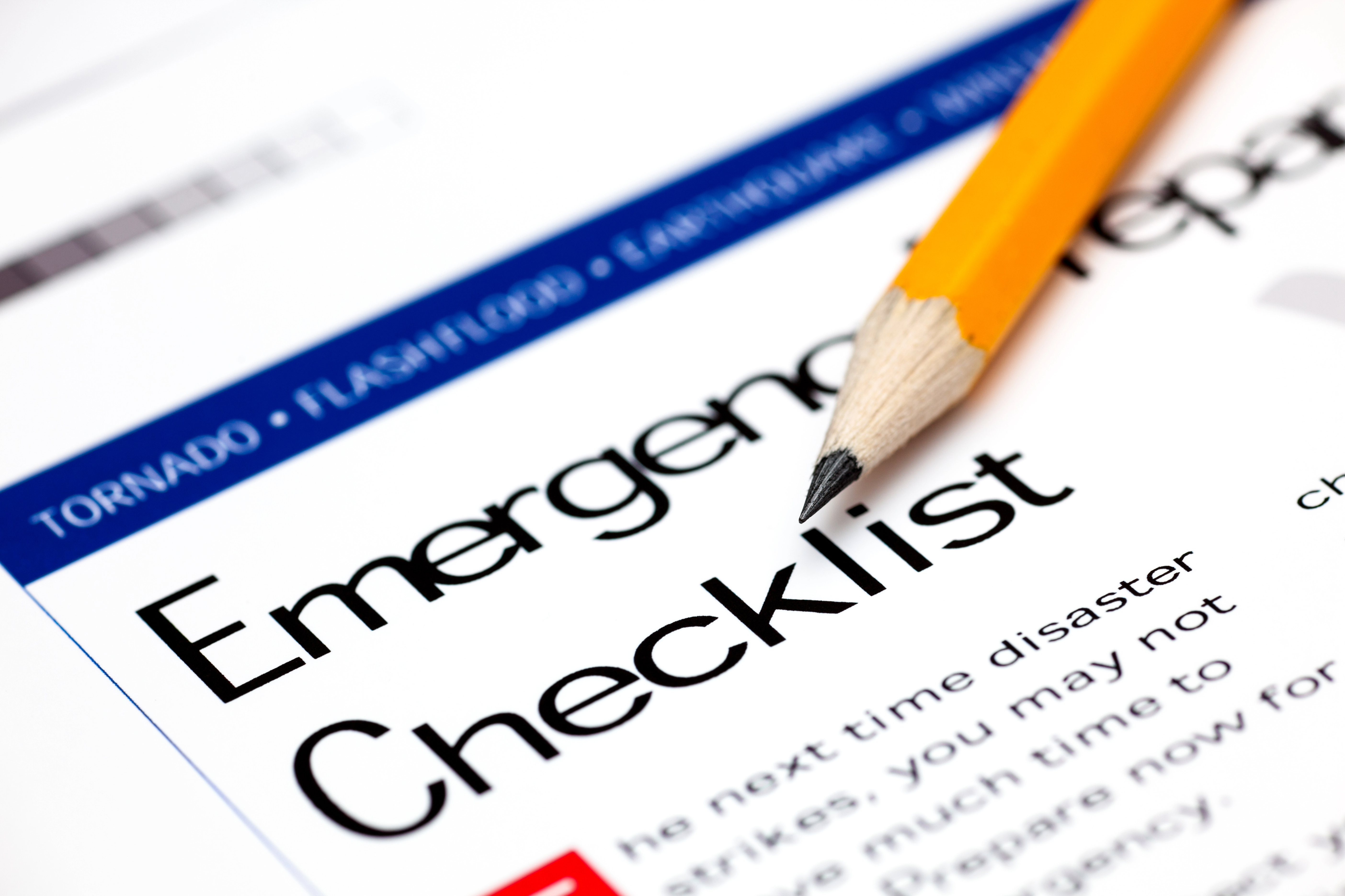 Emergency Preparedness paper checklist with pencil.